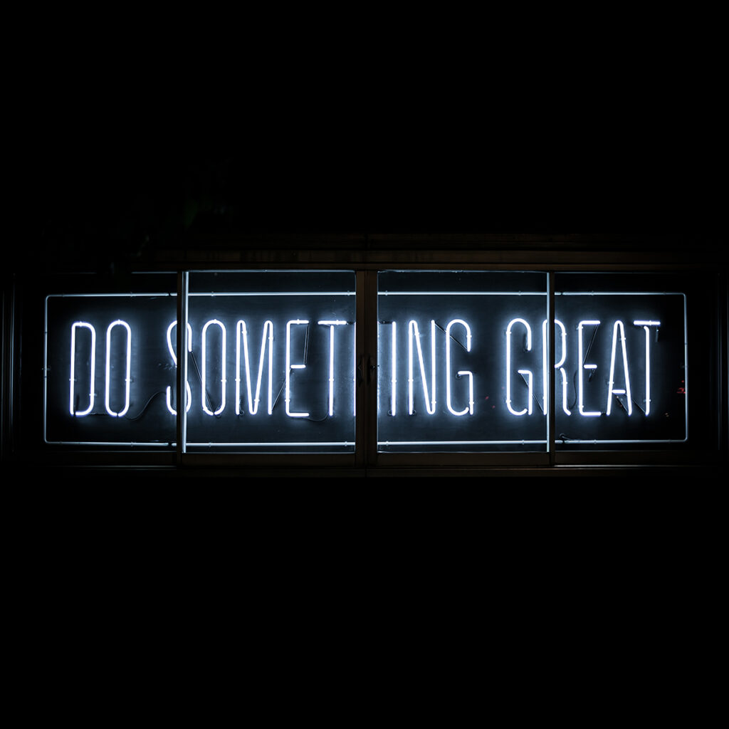"do something great" in white neon light